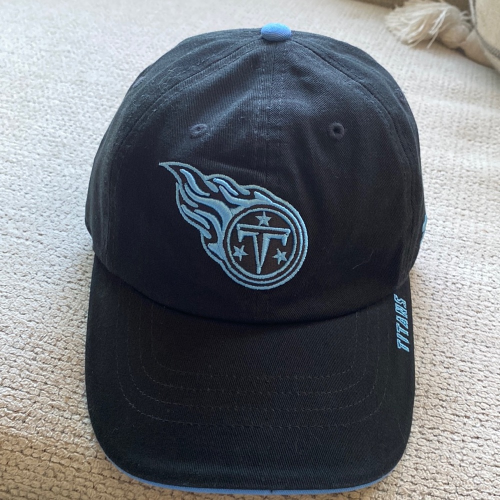 Tennessee Titans Hat NFL Mens Black/Light Blue Symbol
Adjustable Size Cap Hat